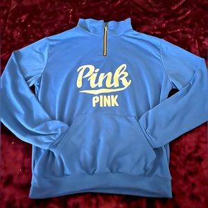 Blue “PINK” sweater.